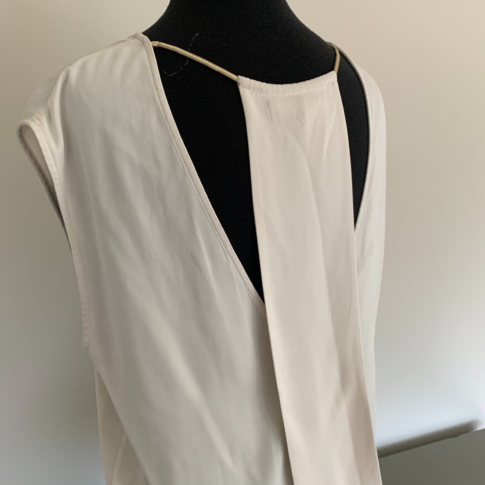 Gorgeous Cream Silk top with unique open back Chain detail